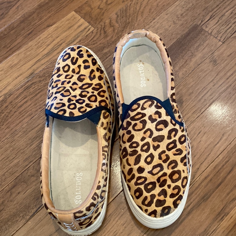 Soludos animal print slip on shoes.
